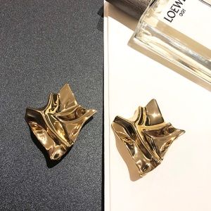 Wrinkled paper statement earrings